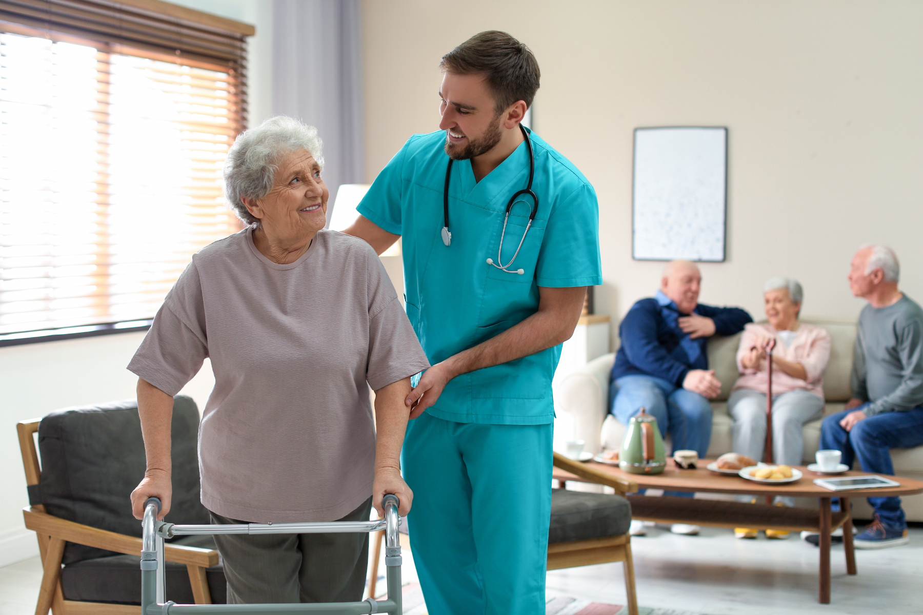 male-nurse-helping-patient_321129844