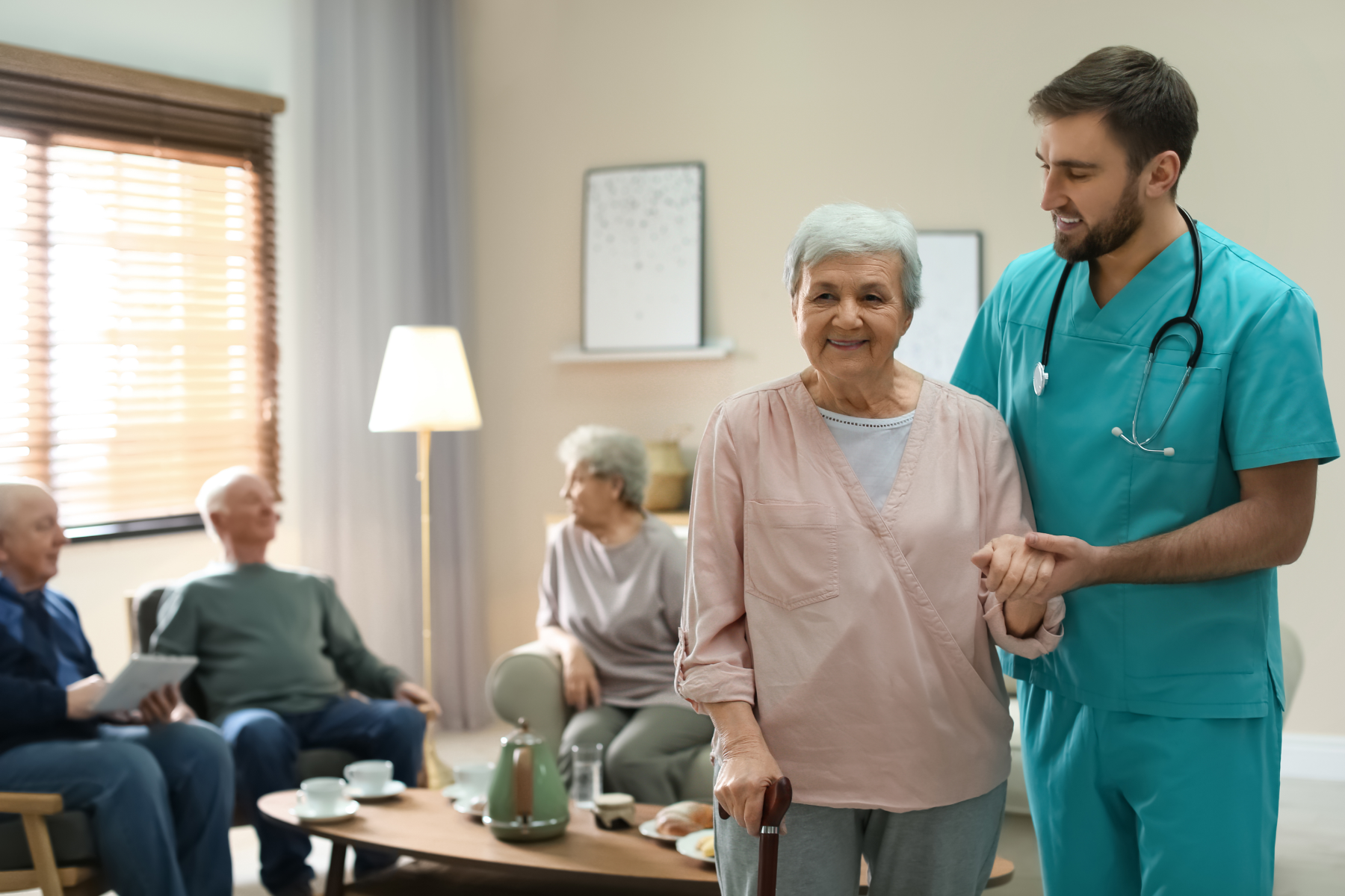 male-nurse-with-patients_321129788