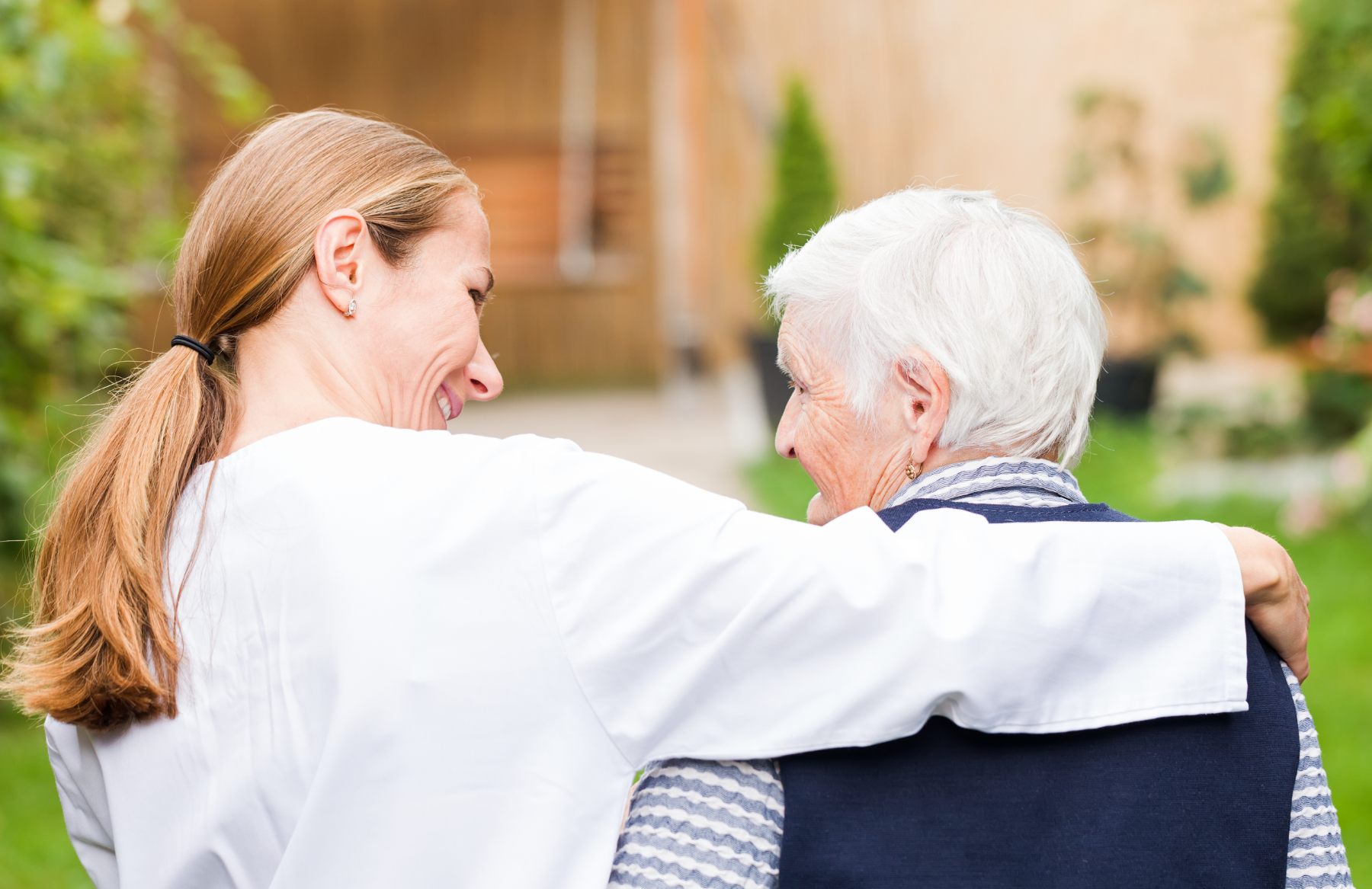 nurse-and-patient-outside_80244312