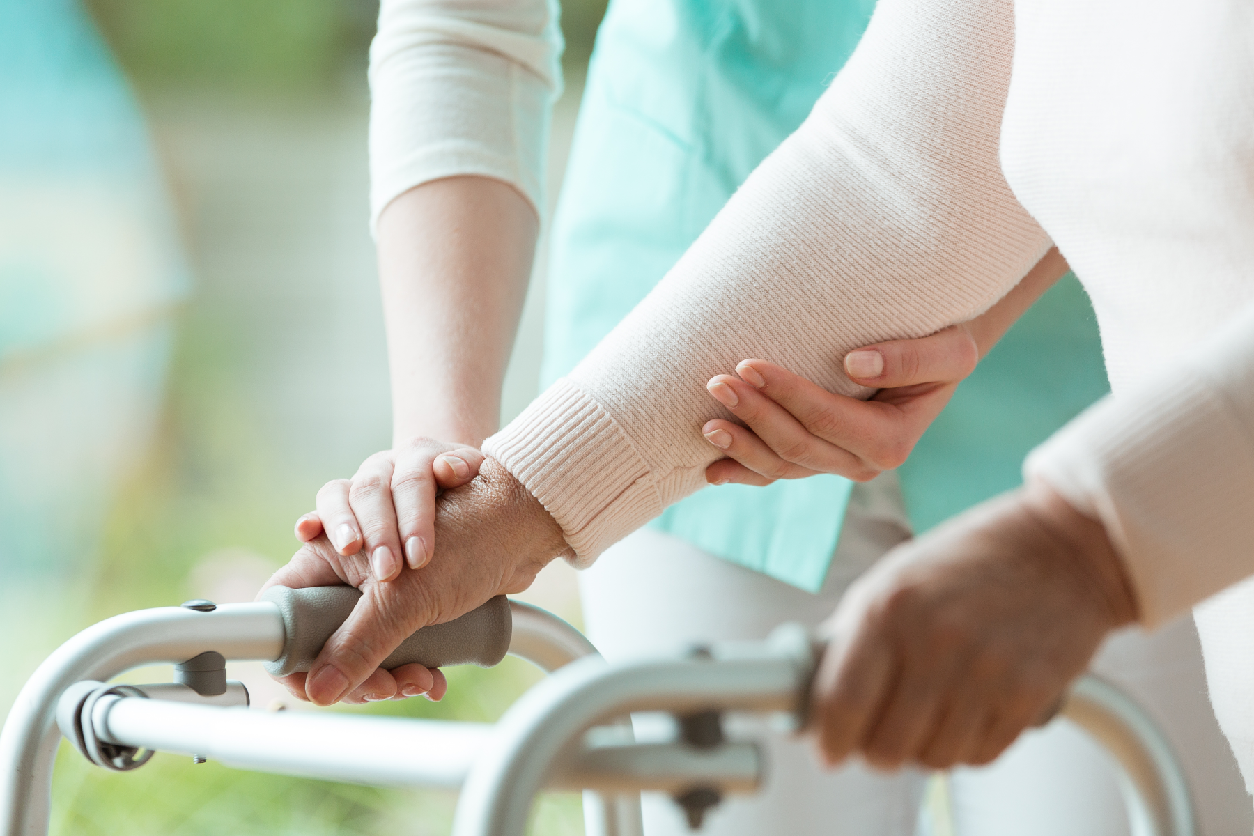 nurse-helping-patient-walk_168209624