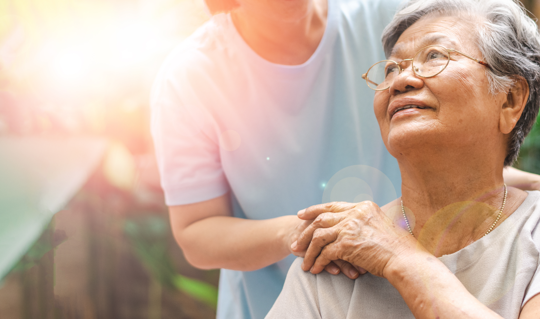 nurse-holding-patient-hand-outside_452928540