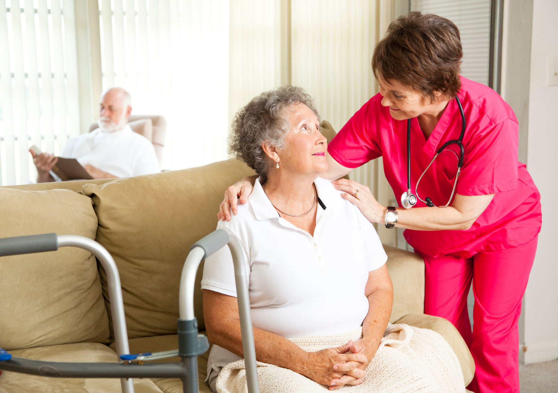 nurse-in-room-with-patients_28886938