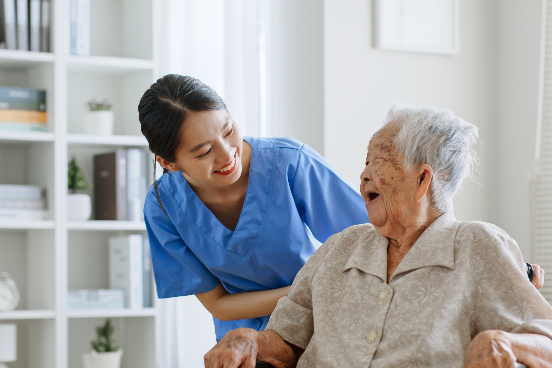 nurse-with-elder-patient_506407731
