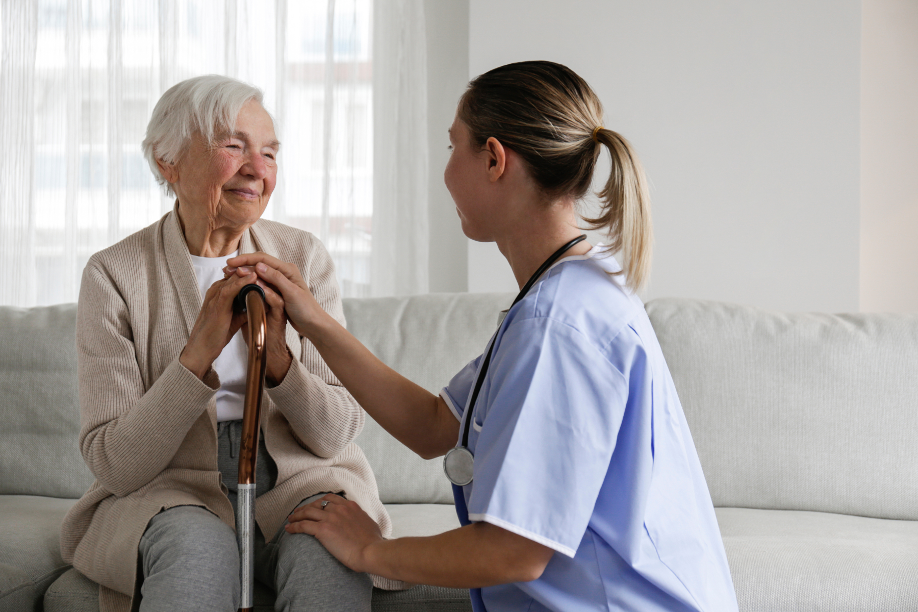 nurse-with-sitting-patient_516589316
