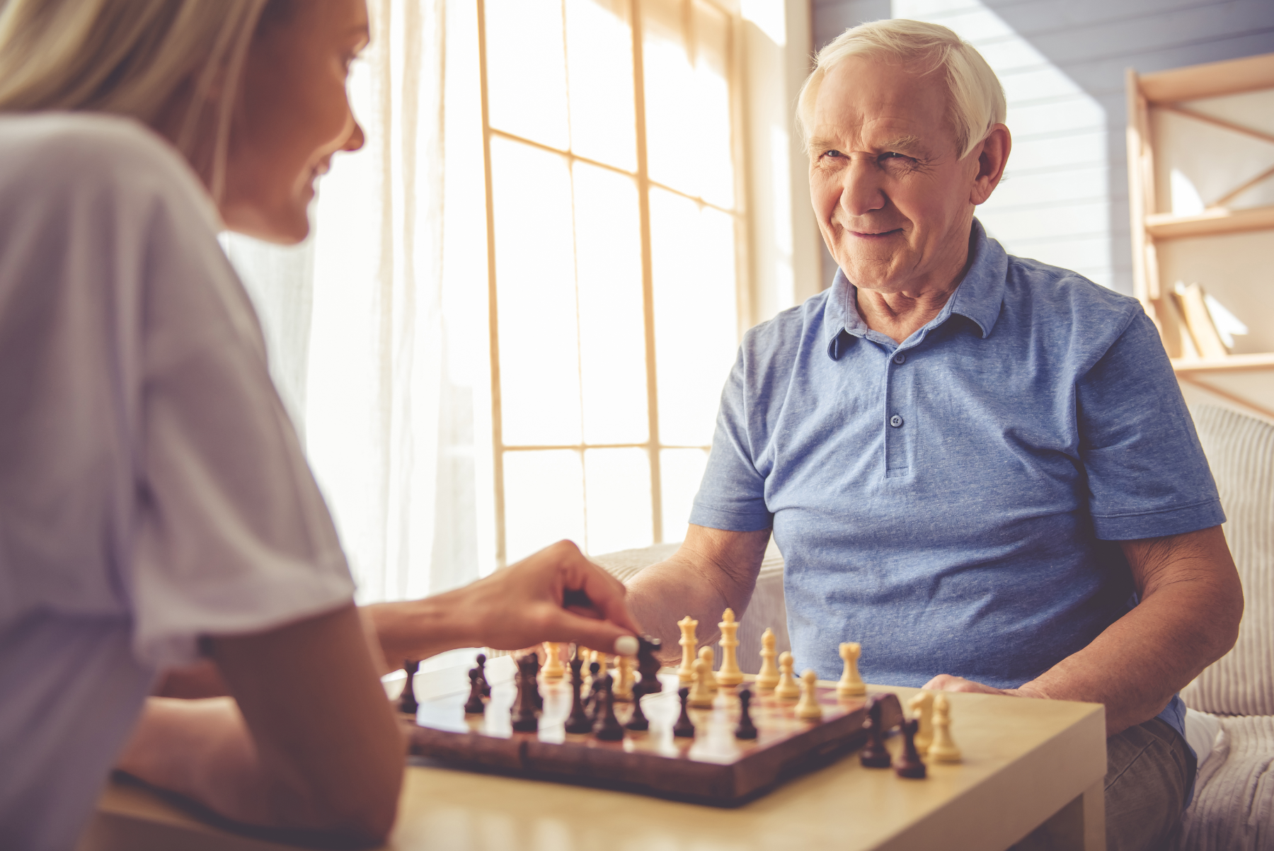 nurse-and-patient-playing chess_123274109